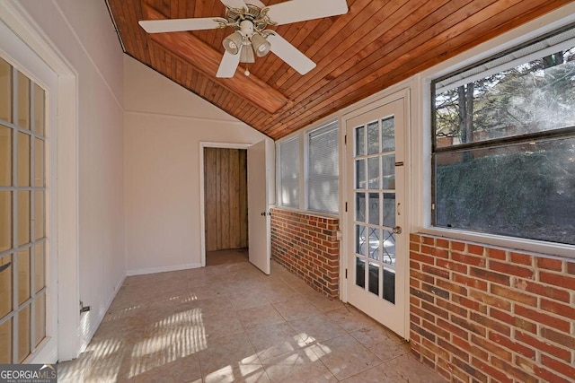 unfurnished sunroom with ceiling fan, lofted ceiling, and wood ceiling