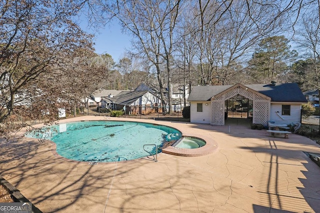 view of swimming pool featuring a patio area