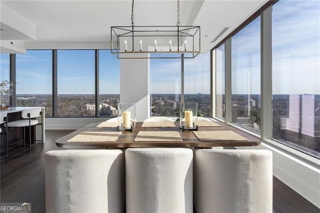 dining area with dark hardwood / wood-style floors