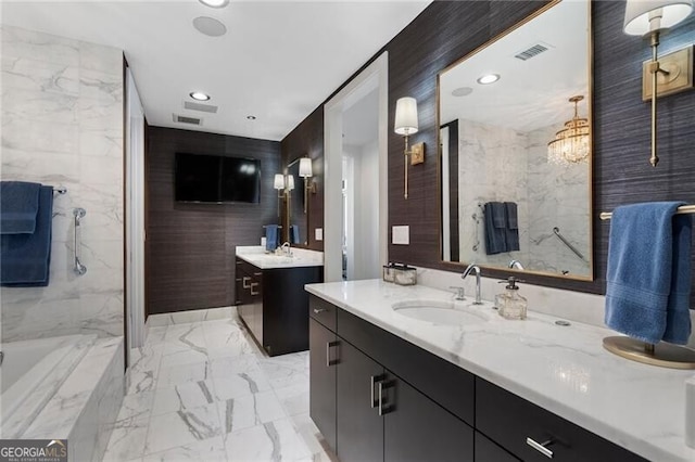 bathroom featuring vanity and a bathtub