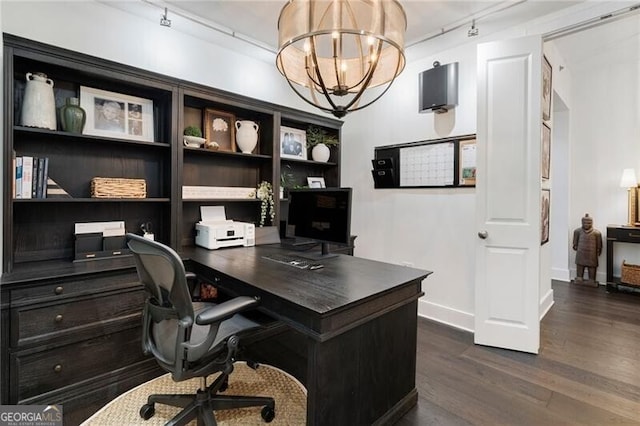 office area featuring a chandelier, rail lighting, and dark hardwood / wood-style floors