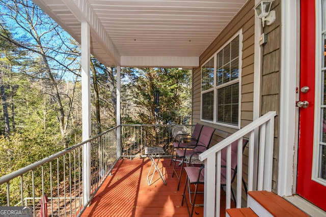 balcony featuring a sunroom