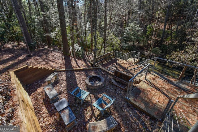 view of yard featuring a fire pit