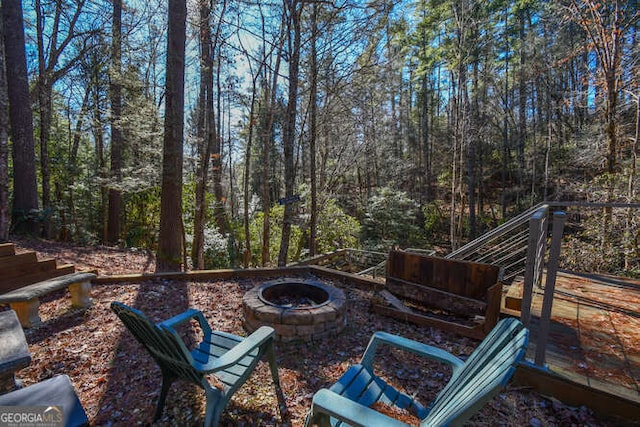 exterior space featuring a fire pit