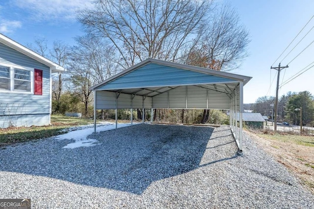 view of parking / parking lot featuring a carport