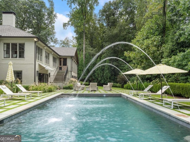 3612 Castlegate Dr NW, Atlanta, GA 30327 - pool with a yard and stairs
