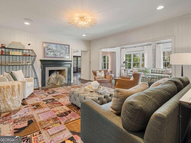 living room with ornamental molding