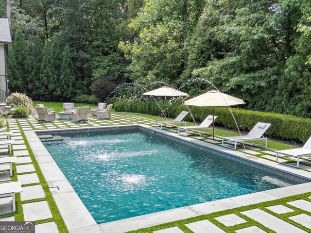 3612 Castlegate Dr NW, Atlanta, GA 30327 - outdoor pool with an outdoor living space and a patio