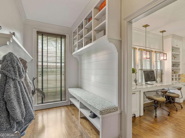 3612 Castlegate Dr NW, Atlanta, GA 30327 - mudroom with wood finished floors and crown molding