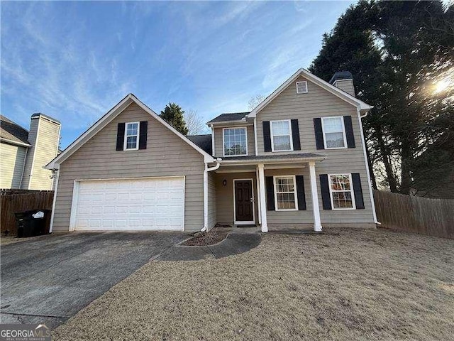 front facade with a garage