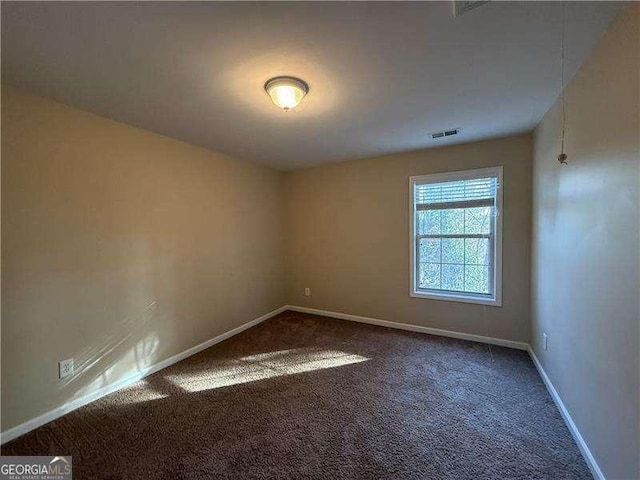 empty room with carpet floors