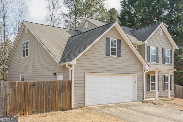 view of side of home featuring a garage