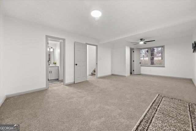 interior space featuring ceiling fan