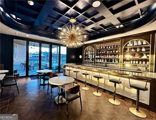 bar with a notable chandelier, parquet floors, and coffered ceiling