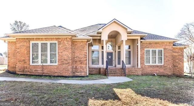 ranch-style house with a front yard