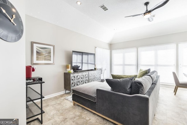 bedroom with ceiling fan and lofted ceiling