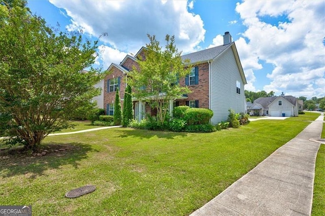 view of front of home with a front yard