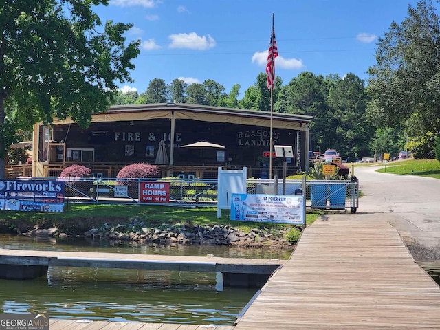 dock area with a water view