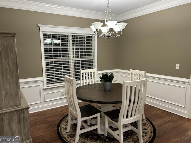 dining space with a notable chandelier, ornamental molding, and dark hardwood / wood-style floors