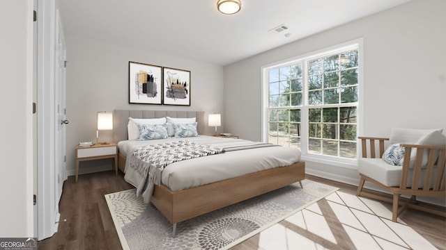 bedroom featuring wood-type flooring