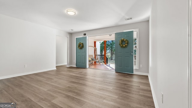 foyer with hardwood / wood-style floors