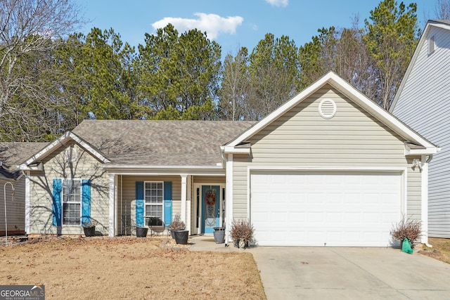 ranch-style house featuring a garage