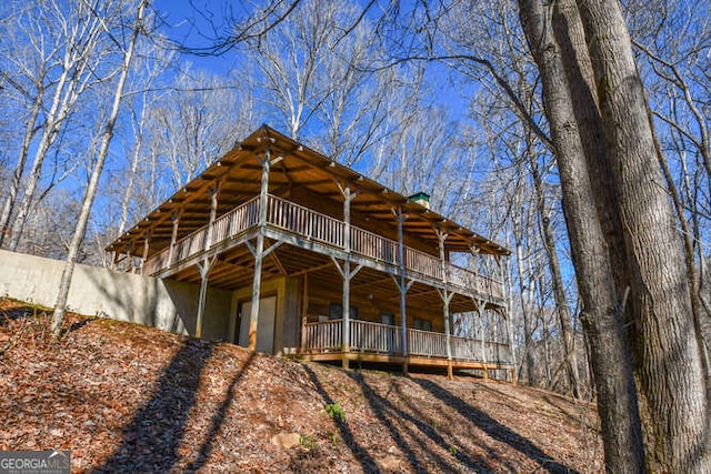 exterior space featuring a wooden deck