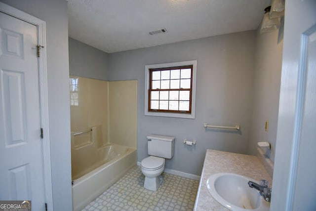 full bathroom featuring toilet, vanity, and shower / tub combination