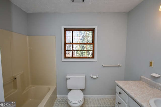 full bathroom featuring shower / bathtub combination, a textured ceiling, toilet, and vanity