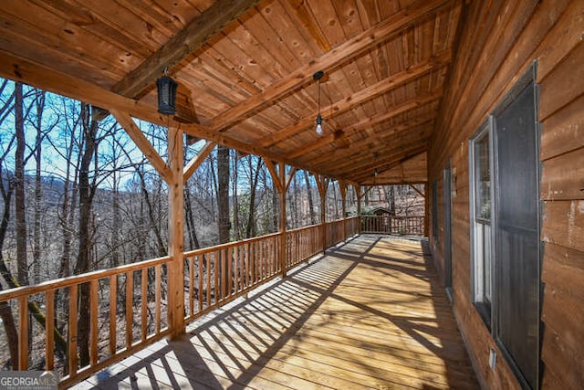 view of snow covered deck