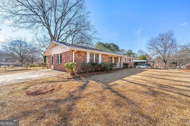 single story home featuring covered porch