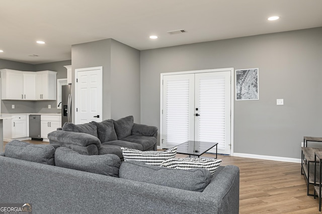 living room featuring light hardwood / wood-style floors