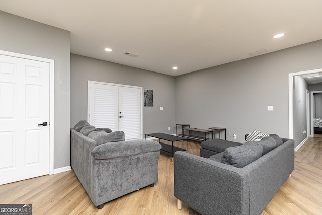 living room with hardwood / wood-style floors