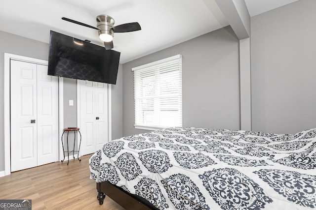 bedroom featuring ceiling fan and light wood-type flooring