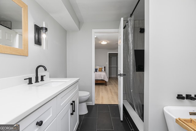 full bathroom with vanity, tile patterned floors, independent shower and bath, and toilet