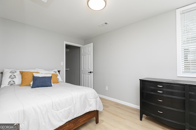 bedroom featuring light wood-type flooring