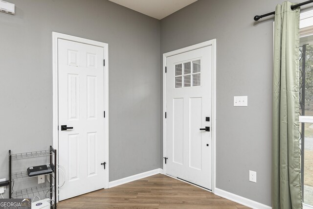 foyer featuring hardwood / wood-style floors