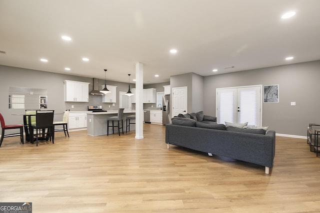 living room featuring light hardwood / wood-style floors