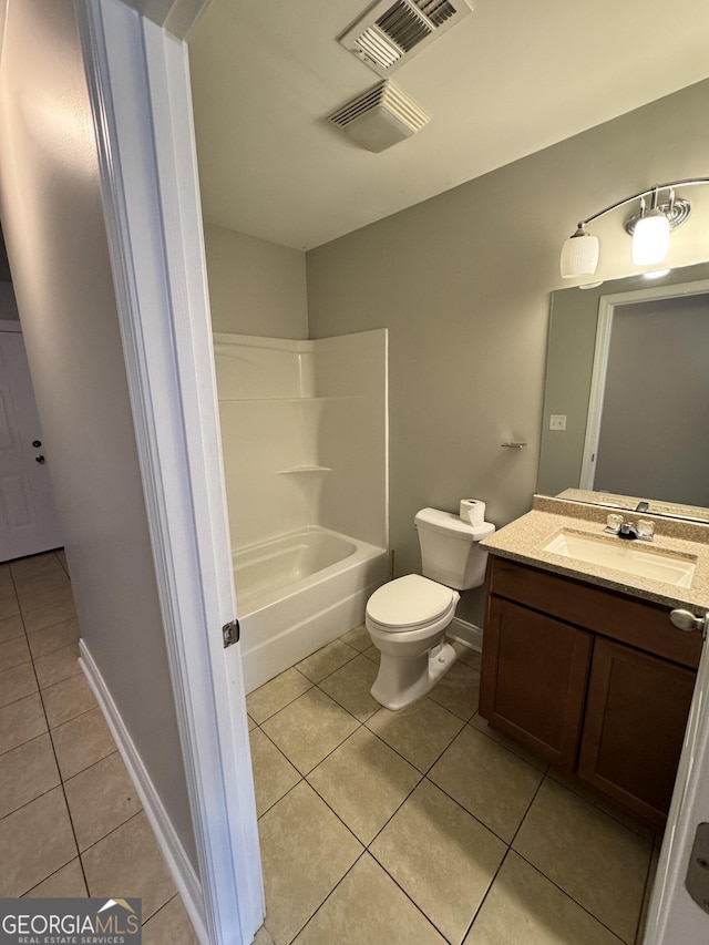 full bathroom featuring toilet, tile patterned flooring, vanity, and bathtub / shower combination