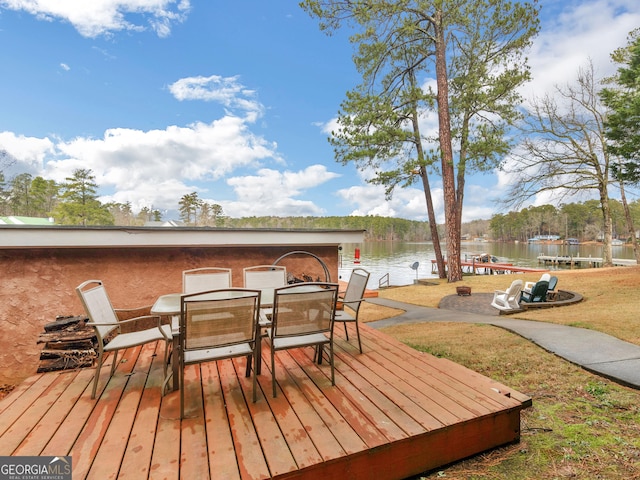 wooden terrace with a water view