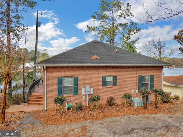 view of property exterior featuring central AC