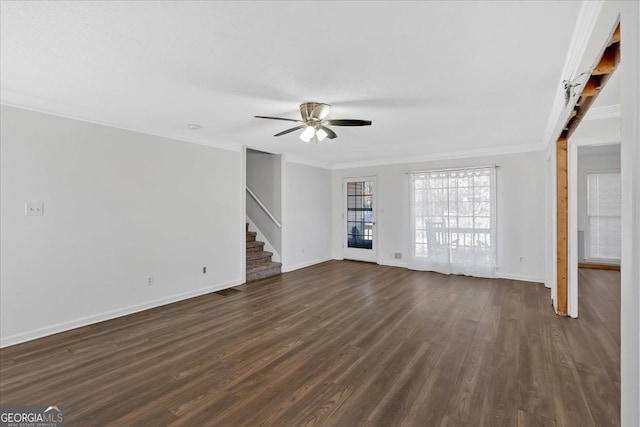 unfurnished living room with ceiling fan, dark hardwood / wood-style flooring, and ornamental molding