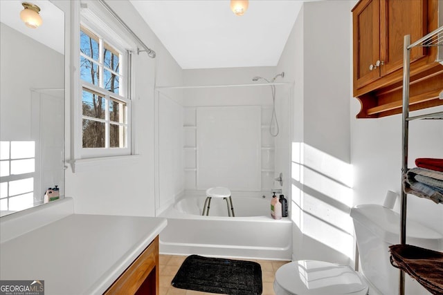 full bathroom with toilet, vanity, and bathing tub / shower combination