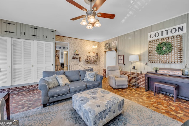 living area with a ceiling fan