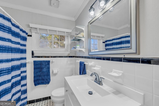 full bath with curtained shower, crown molding, toilet, vanity, and tile walls