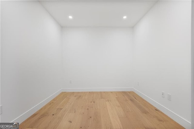 spare room with light wood-type flooring