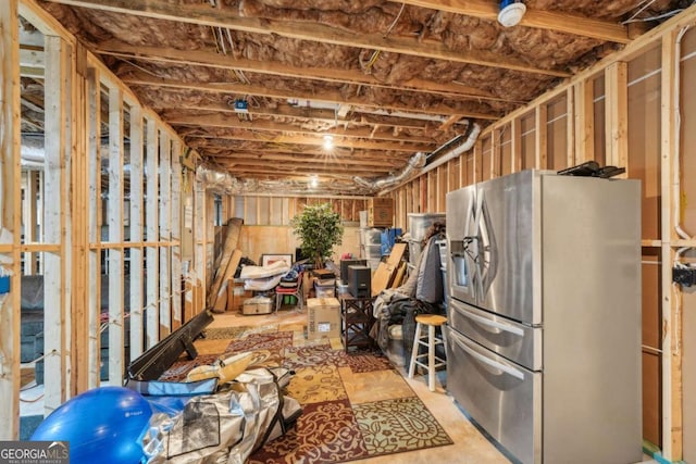 interior space featuring stainless steel fridge