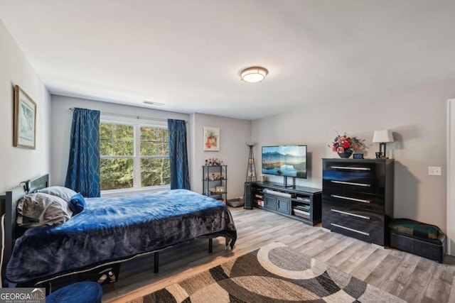 bedroom featuring light hardwood / wood-style floors