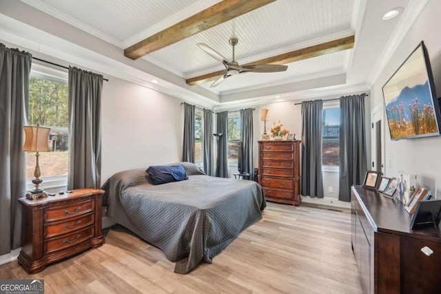 bedroom with ceiling fan, beam ceiling, crown molding, and light hardwood / wood-style flooring