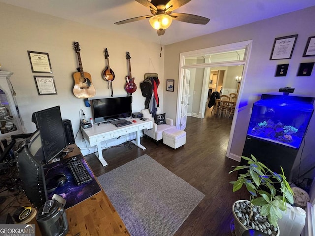 living room with ceiling fan and dark hardwood / wood-style flooring